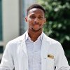 African American Doctor Male At Lab Coat With Stethoscope Outdoor.
